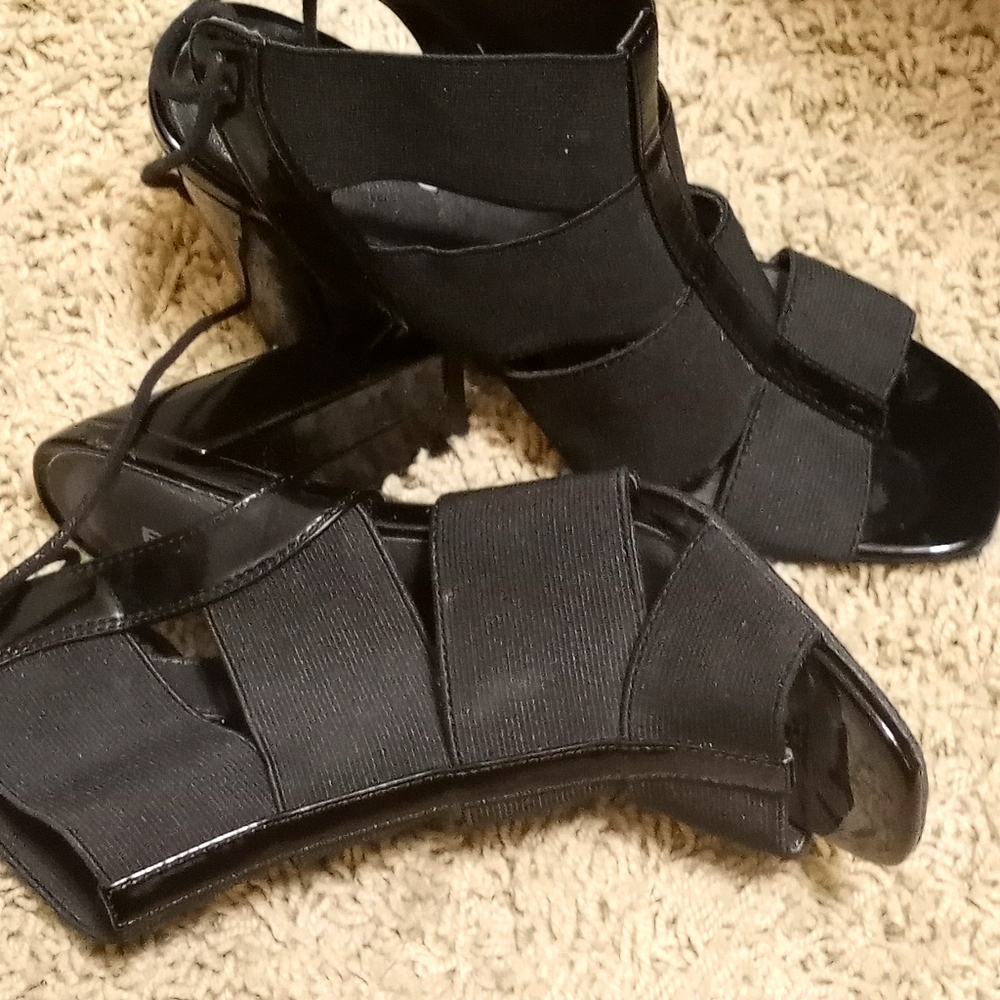 Black, high heeled sandals.